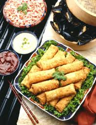 Bangkok City Restaurant signature dishes Crispy Spring Rolls, Satay, Tom-Yum.